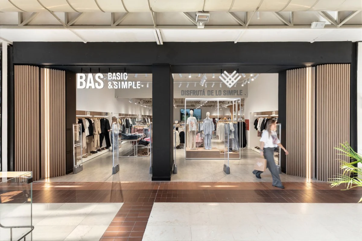 BAS Retail Store - Modern shopfront design with vertical wood slats and wide glass entrance - Contract Workplaces.webp